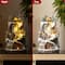 Glitzhome® 15.5" Lighted Christmas Skiing Moutain Resin Village with Movement and Music